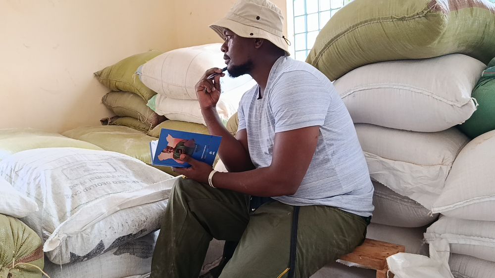 Hilary reflecting and taking notes during a day at Afrifama